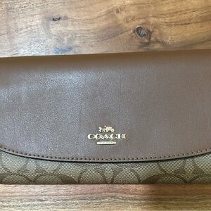 Coach Brown and Tan Signature Clutch